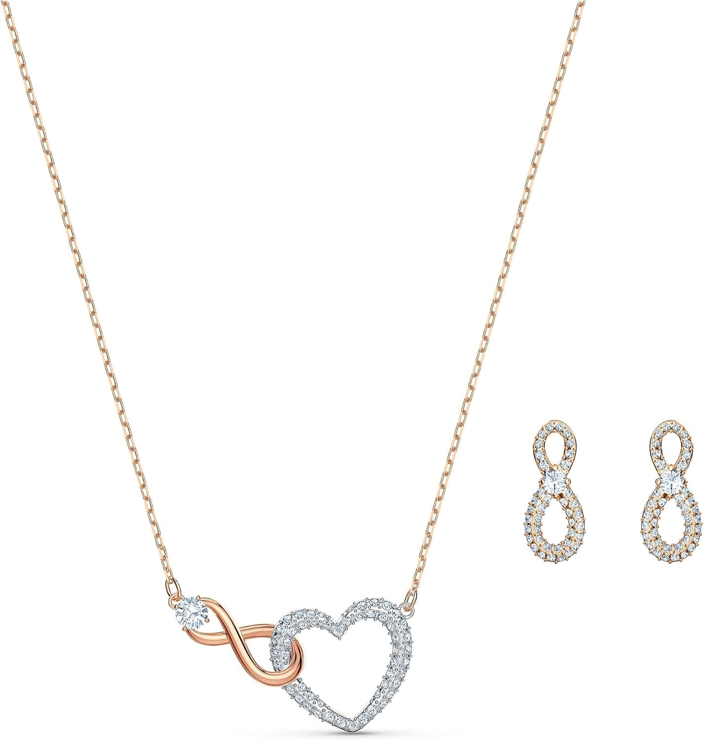 Juego de collar y aretes con diseño infinito de Swarovski con pavé de cristal transparente y acabado chapado en metales mixtos con diseño de infinito y corazón