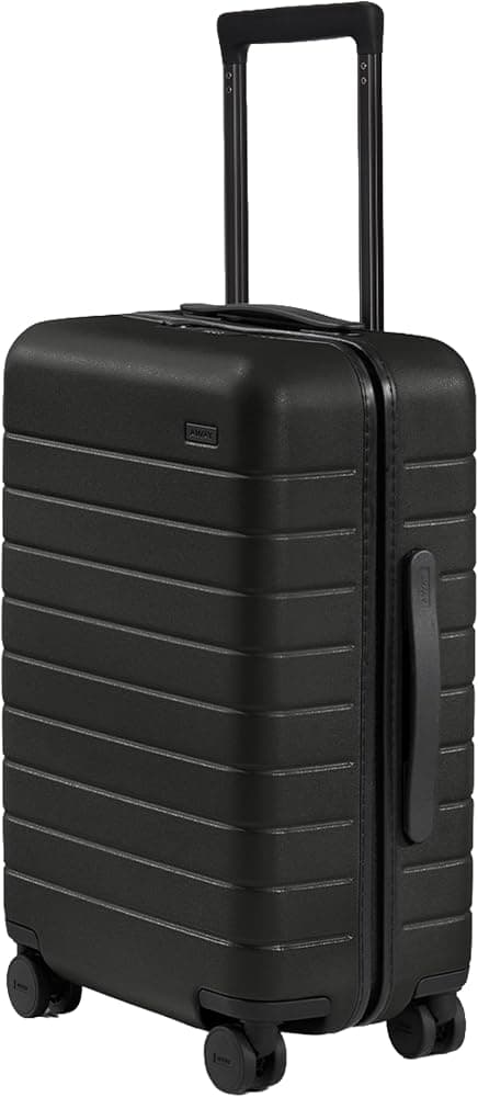 Away The equipaje de mano, maleta giratoria rígida y liviana de 22 pulgadas | Duraderas y livianas, ruedas giratorias premium de 360°, sistema de compresión interior, bloqueo aprobado por la TSA, negro azabache