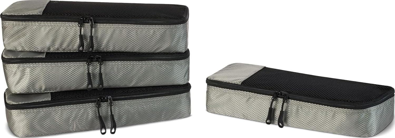 Amazon Essentials Cubos de embalaje delgados de 4 piezas, juego de accesorios de viaje, organizador de equipaje, organizador de maletas con doble cremallera, parte superior de malla, ahorro de espacio, gris (anteriormente Amazon Basics)