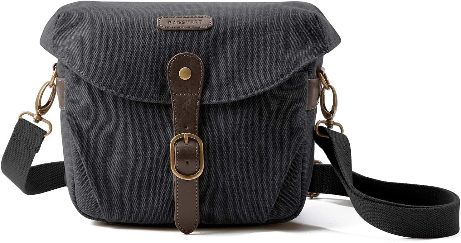 BAGSMART Bolso bandolera de lona para cámara con cubierta para la lluvia para mujeres y hombres, negro | Estuche para cámara SLR DSLR, bolso de hombro para cámara compacta